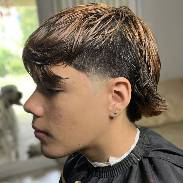 Textured flow haircut with mid taper — JM Barber Co., Lake Park, FL Textured flow haircut and mid taper at JM Barber Co. in Lake Park, Florida