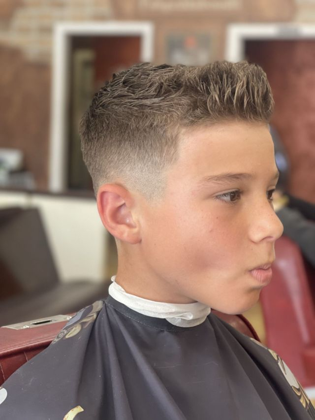 Kids' fade haircut — JM Barber Co., Lake Park, Florida Kids' fade with textured spiky top at JM Barber Co. in Lake Park, FL